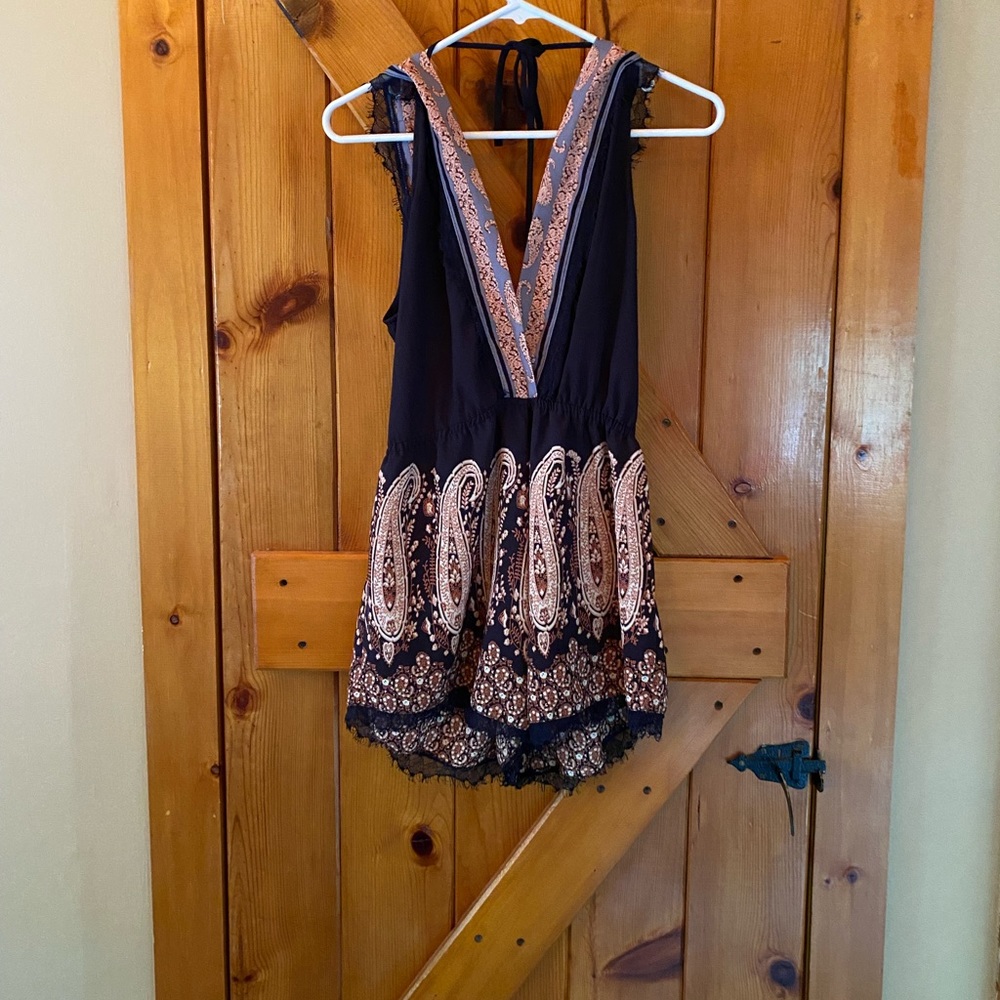 Beautiful romper, triangle open back